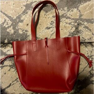 Burgundy tote never been carried (no imperfections)